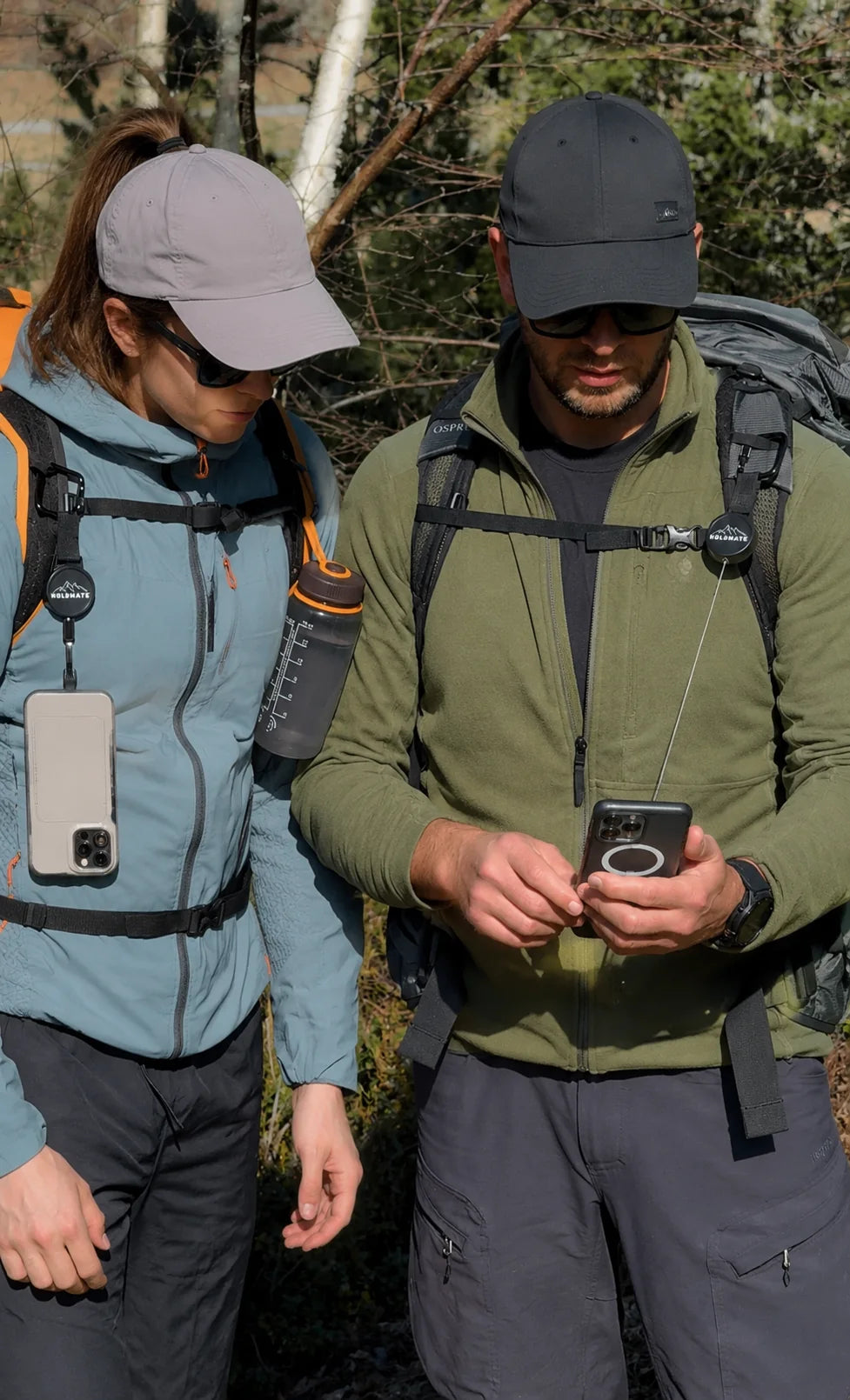 Hikers keeping their phones secure with Kravdon